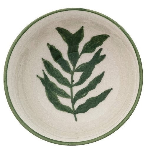 CREATIVE COOP's HAND-PAINTED STONEWARE BOWLS WITH BOTANICAL DESIGN, some holding green peppers or grains, are arranged on a light beige surface—each bowl highlights its unique handcrafted artistry.