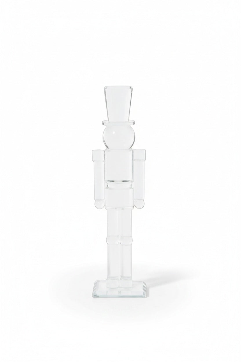 Two 12″ ZODAX GLASS NUTCRACKER figures stand in front of two stacks of red glittery gift boxes tied with ribbon.