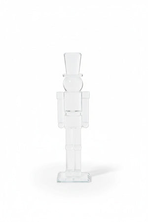 Two 12″ ZODAX GLASS NUTCRACKER figures stand in front of two stacks of red glittery gift boxes tied with ribbon.