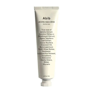 A white tube labeled "COLLAGEN EYE CREME JERICHO ROSE" by ASIAN BEAUTY WHOLESALE stands upright, its black text ingredient list featuring Jericho rose extract—highlighting this hydrating, vegan eye cream in a 30ml tube as a skincare essential.