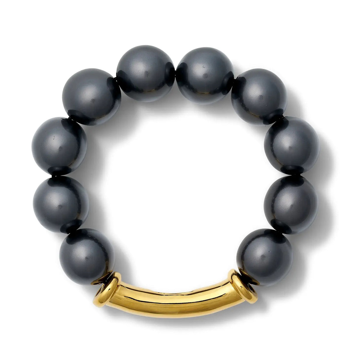 The CC & CO BY CATHERINE CANINO Noir Luxe Black Pebble Pearl Stack Bracelet features round, glossy black beads and a curved gold hardware bar as part of the band, displayed in a circular arrangement on a white background.