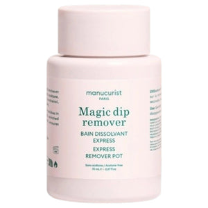 The MANUCURIST - MAGIC DIP REMOVER by MANUCURIST INC comes in a white plastic 70 mL bottle with a screw-on cap, featuring green and pink text on the label. This acetone-free, vegan nail polish remover is designed to gently remove polish and is conveniently travel-friendly for use on the go.