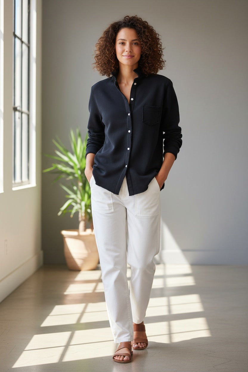 The FRANK &amp; EILEEN Eileen Relaxed Button Up in Triple Fleece British Royal Navy showcases bust-flattering button placement, long rolled-up sleeves, and a chest pocket. Set against a light textured background, it offers classic style and ultimate comfort.