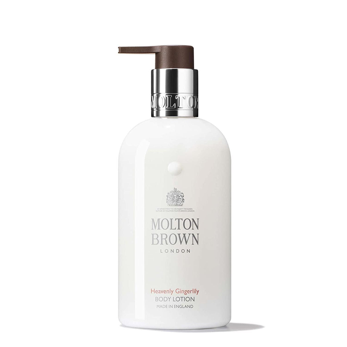 A white bottle of MOLTON BROWN - HEAVENLY GINGERLILY BODY LOTION with a pump dispenser. The label reads "MOLTON BROWN London" and "Heavenly Gingerlily Body Lotion, Made in England." Infused with lily, ginger, and cardamom, the bottle features a metallic silver collar and a brown pump on top.