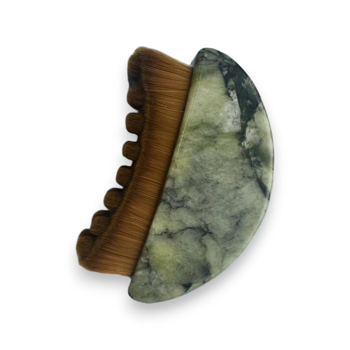 The SMILE BOUTIQUES LYMPHATIC BRUSH WITH NATURAL JADE is a crescent-shaped massage tool featuring soft brown bristles on one side, ideal for facial or scalp massage and perfect for enhancing your skincare routine, displayed against a white background.