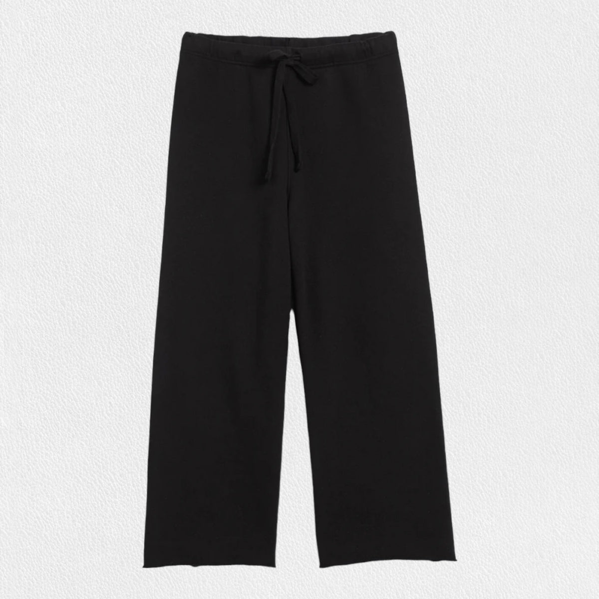 A pair of black, wide-leg pants is laid flat against a plain, light background. The FRANK &amp; EILEEN - CATHERINE Favorite sweatpant features an elastic waistband with a drawstring for an adjustable fit. The fabric appears to be soft and comfortable, suitable for casual wear.