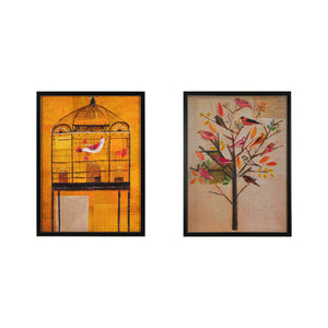 A potted green tree stands beside a white wall decorated with CREATIVE COOP’s FRAMED CANVAS WALL ART WITH HAND-PAINTED BIRDS, featuring a yellow birdcage and perched bird.