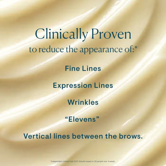 A turquoise jar of ELEMIS - PRO-COLLAGEN MORNING MATRIX cream displays its off-white texture. This &quot;Performance day cream&quot; by ELEMIS - STEINER combats expression lines and boosts collagen amidst a crisp white background.