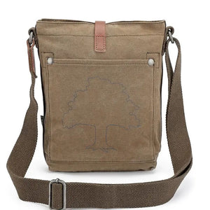 The TSD BRAND - FOREST ZIP CROSSBODY BAG IN OLIVE is a military-inspired khaki canvas bag with a front pocket, brown adjustable strap, decorative leather buckle, metal rivets, and textured shoulder strap for style and durability.