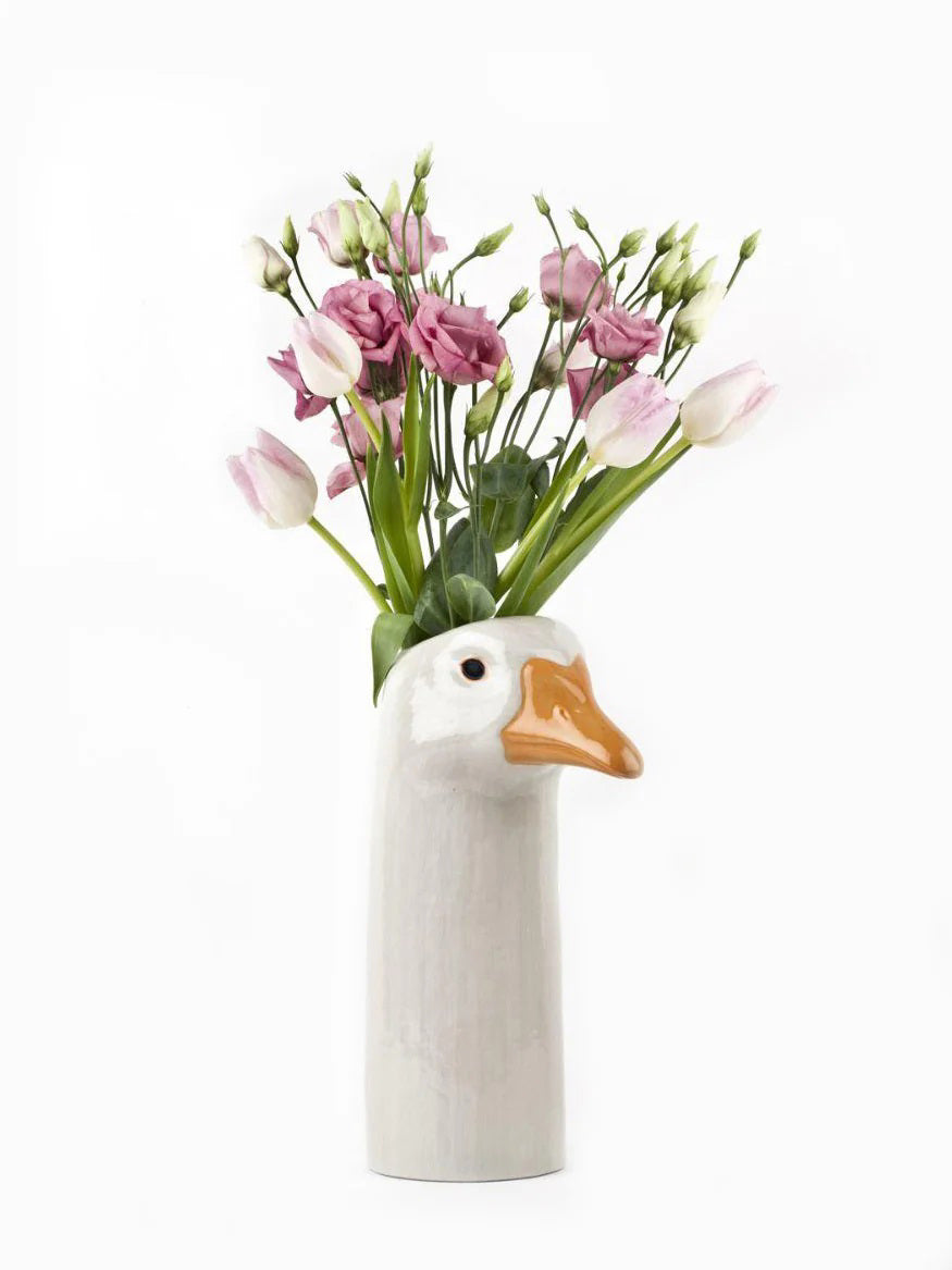 The QUAIL CERAMICS – GOOSE FLOWER VASE by QUAIL DESIGNS is a hand painted stoneware vase shaped like a goose’s head and neck, featuring a white body, orange beak, and black eye, displayed upright on a plain white background.