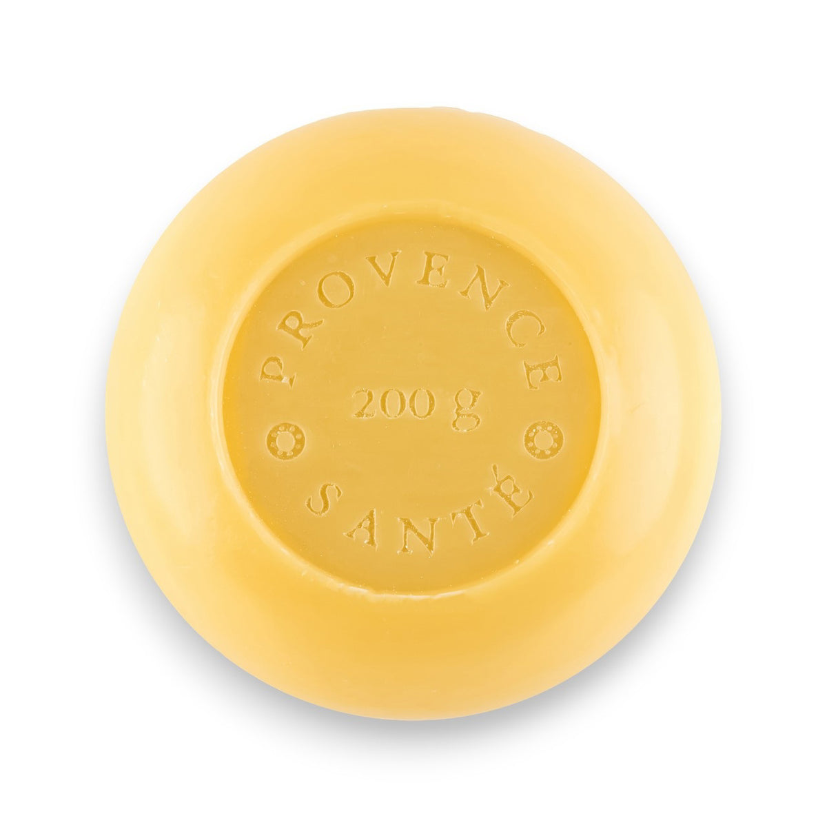 A round, yellow bar of French-milled soap with the text &quot;BAUDELAIRE 7oz&quot; embossed in the center. Enriched with shea butter, this smooth, shiny bergamot soap boasts a simple and elegant circular design.