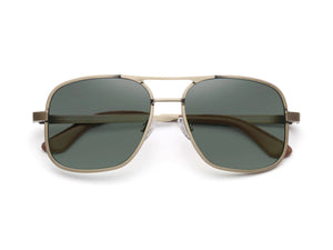 Front view of CADDIS - METAMODERNIST SCOUT SUNGLASSES by CADDIS, featuring an aviator-style sleek metal alloy frame and dark green premium tinted lenses, displayed on a white background.