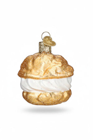 CREAM PUFF ORNAMENT shaped like a choux pastry profiterole with golden shells and a white cream filling.
