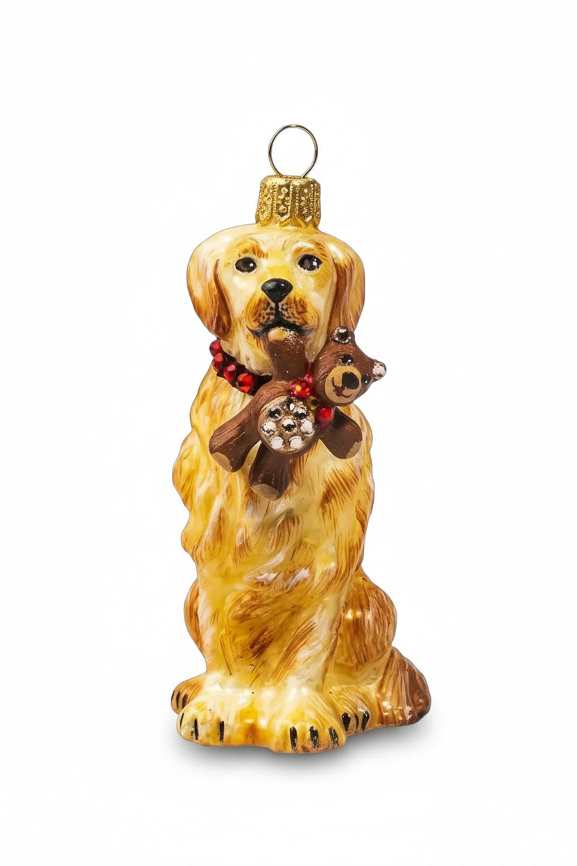 A JOY TO THE WORLD COLLECTIBLES GOLDEN RETRIEVER WITH TEDDY BEAR ORNAMENT, featuring a handmade glass golden retriever wearing a red beaded collar and holding a small brown teddy bear.