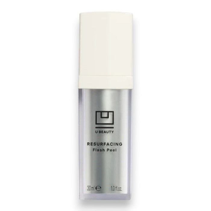 A sleek silver and white 30 ml (1.0 fl oz) bottle of U BEAUTY RESURFACING FLASH PEEL features a minimalist label and white cap; this rapid chemical exfoliator gently resurfaces and brightens skin.