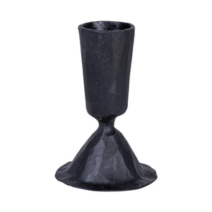 The CREATIVE COOP HAND-FORGED CAST IRON TAPER HOLDER in black features a hammered texture, wide flared base, and slender cylindrical top—ideal for industrial decor and shown upright against a plain white background.