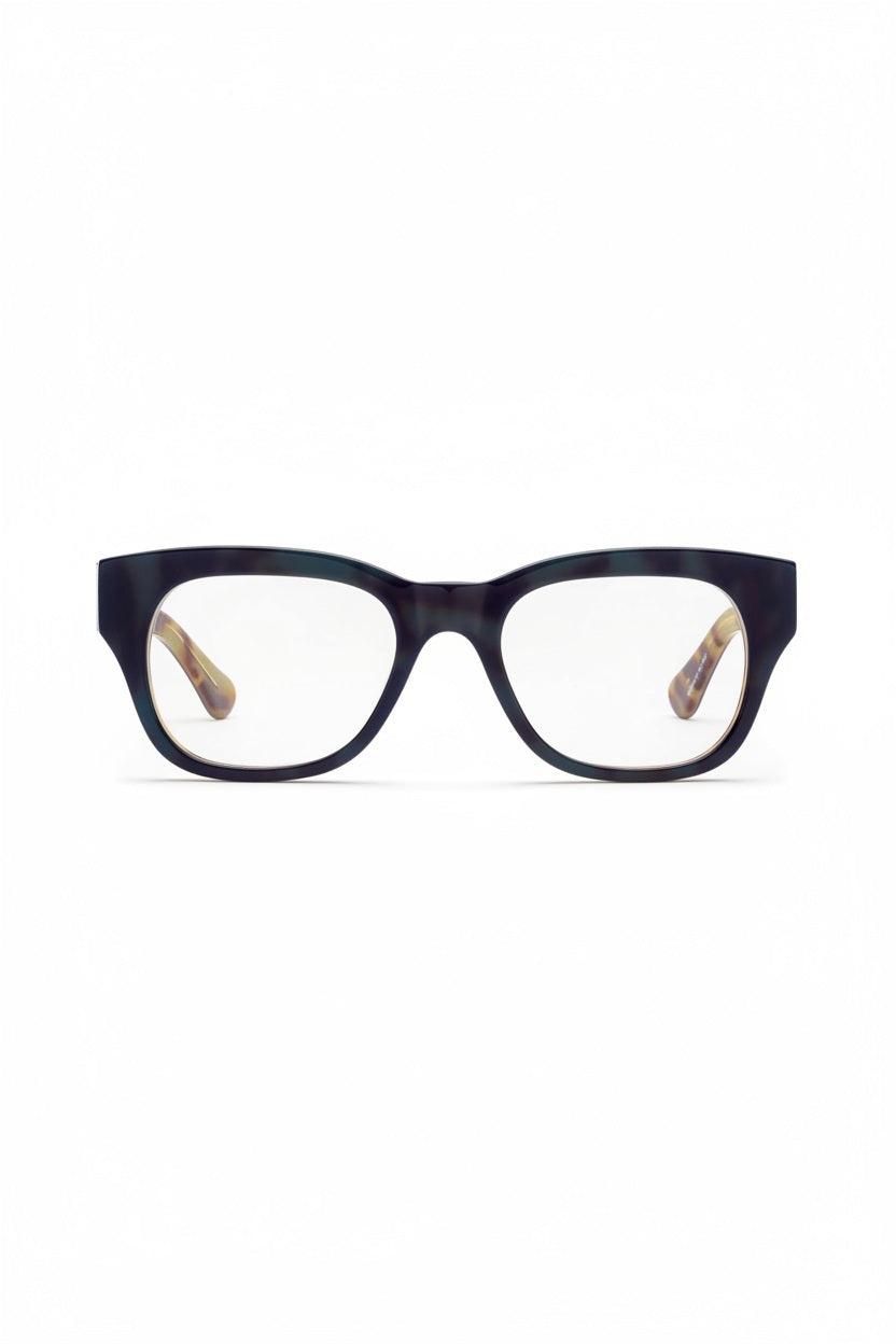 CADDIS - MIKLOS PROGRESSIVE READERS IN CONTRABAND by CADDIS, featuring thick black rectangular frames with durable scratch-resistant lenses and tortoiseshell-patterned temple arms, displayed on a white background.