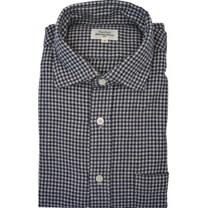 The HARTFORD - PAUL Checked Flannel Shirt in Navy is a men’s cotton flannel shirt featuring a classic blue and white gingham check pattern.