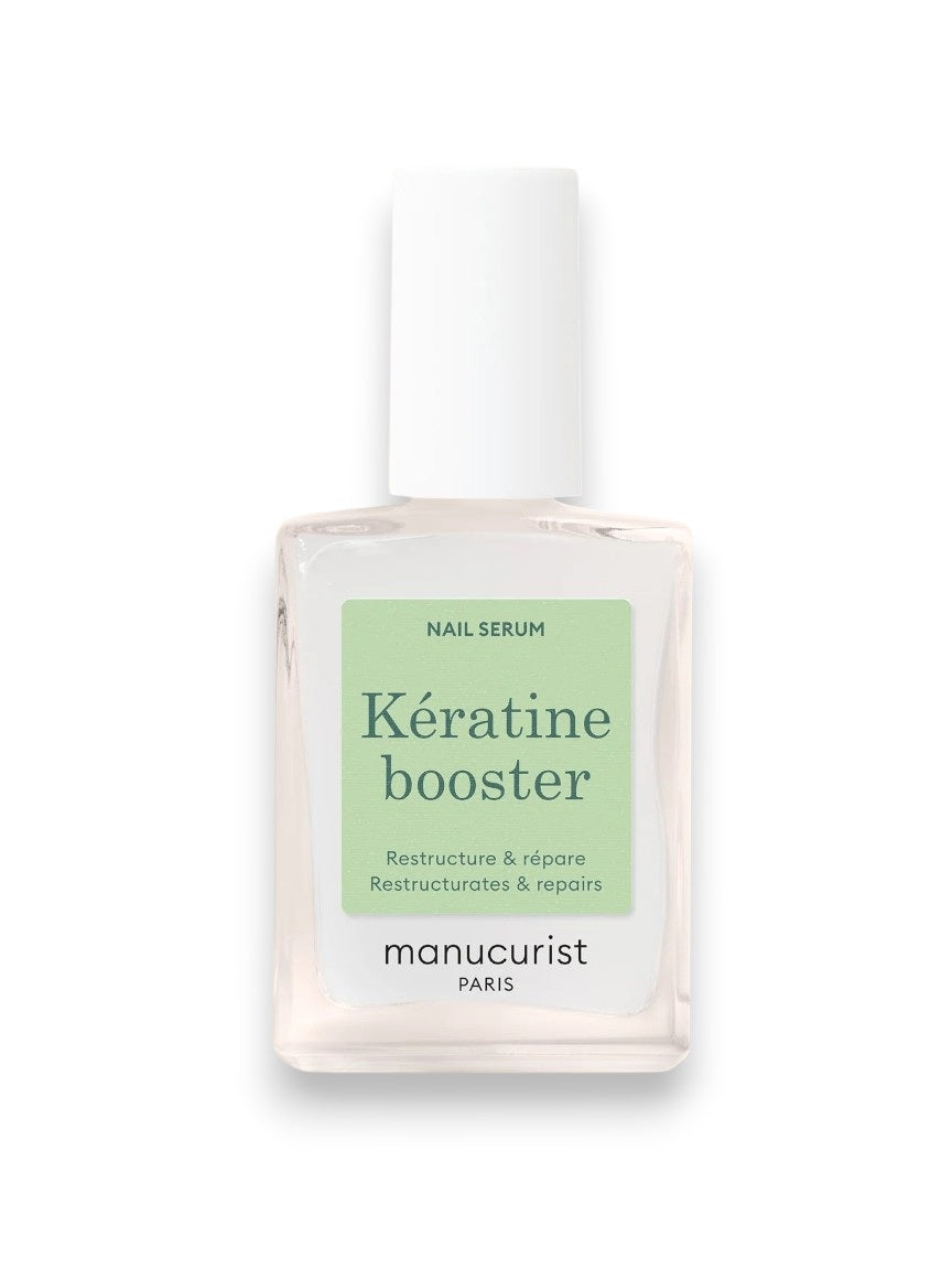 A bottle of MANICURIST INC MANICURIST - KERATIN BOOSTER highlights plant keratin for nourishment, AHA and gluconolactone for exfoliation, biotin and silicon to strengthen nails, and vitamin C for protection.