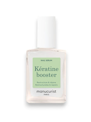 A bottle of MANICURIST INC MANICURIST - KERATIN BOOSTER highlights plant keratin for nourishment, AHA and gluconolactone for exfoliation, biotin and silicon to strengthen nails, and vitamin C for protection.