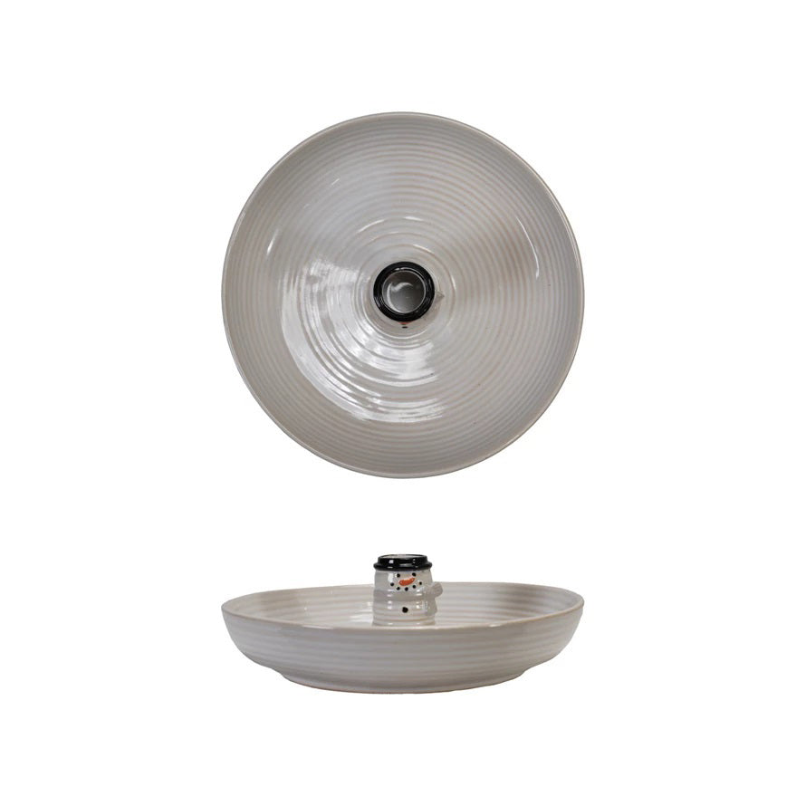 The CREATIVE COOP STONEWARE BOWL WITH SNOWMAN SHAPED TOOTHPICK HOLDER features a circular, ribbed design with a central opening and a glossy white finish, shown in top and side views.