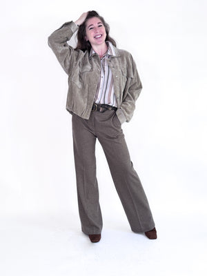 The SEVENTY VENEZIA Stripe Blouse by SEVENTY is an Italian-made viscose shirt with long sleeves, a classic collar, and vertical stripes in white, beige, brown, and gray. Its slightly loose fit provides effortless style.