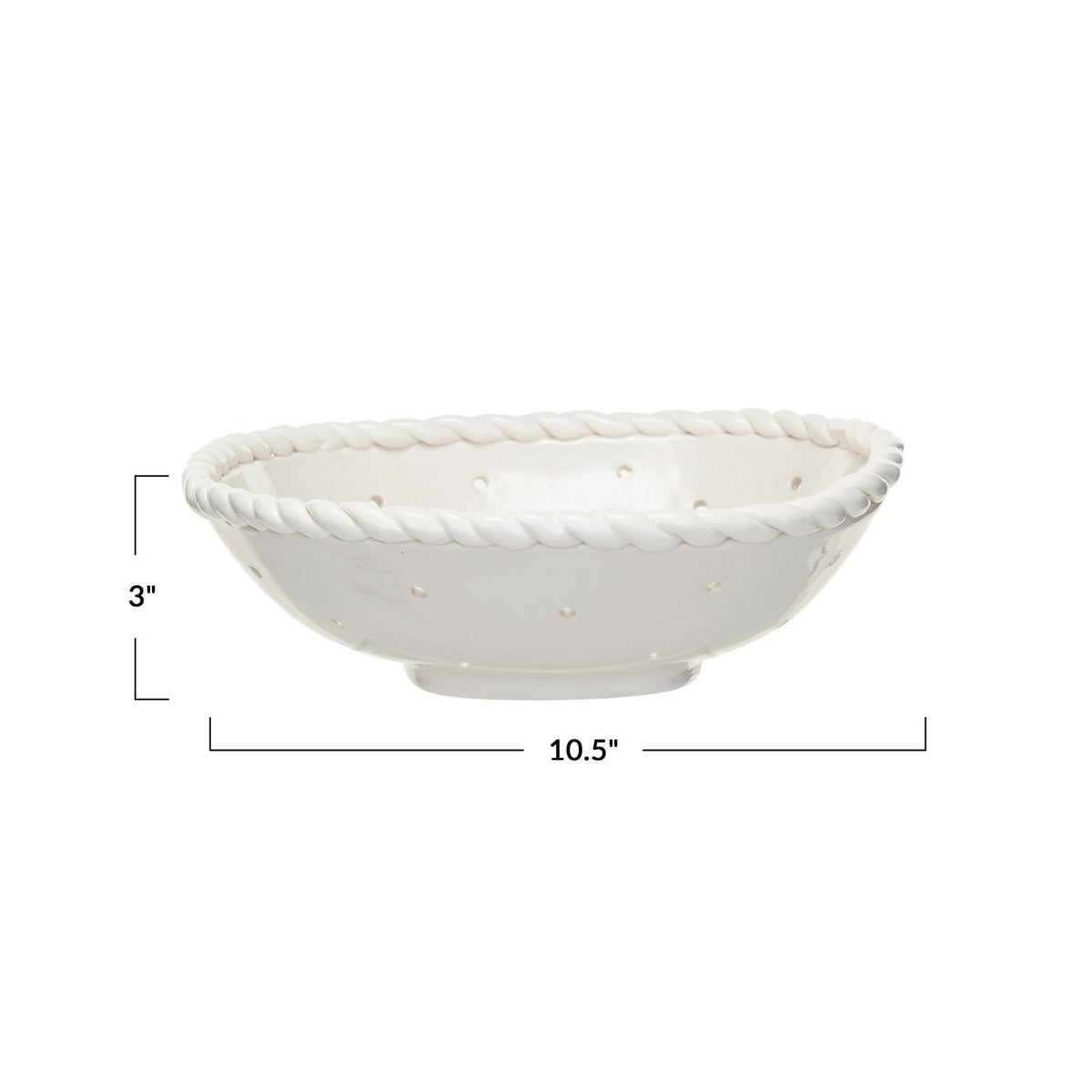 The CREATIVE COOP STONEWARE COLANDER WITH HAND TWISTED EDGE, shown holding three grapefruits on a light textured surface, adds farmhouse charm to any kitchen.