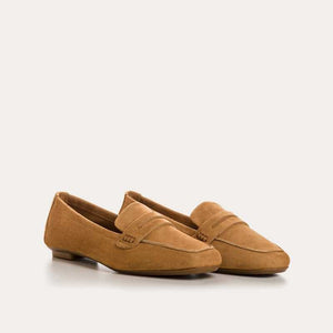 Close-up of REQINS - HEMA SUEDE LOAFER IN CAMEL, featuring a stitched design, decorative strap, leather insole, and soft textured finish for a classic and elegant look.