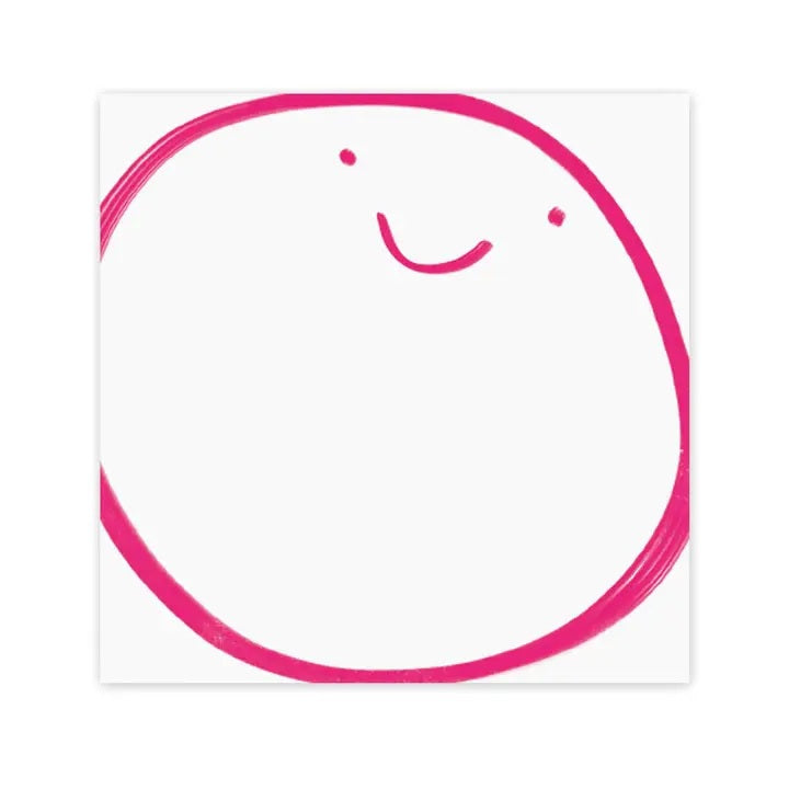 The E. FRANCES – CHUNKY NOTEPAD BIG SMILE by E. FRANCES PAPER features a playful pink smiley face on a white 6x6 notepad with thick chipboard backing.