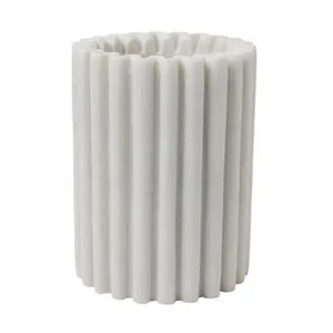 The BE HOME - WATERLOO MARBLE BOTTLE HOLDER by BE HOME, INC features white marble with vertical ridges, resembling a modern vase—an elegant and stylish wine accessory for any setting.