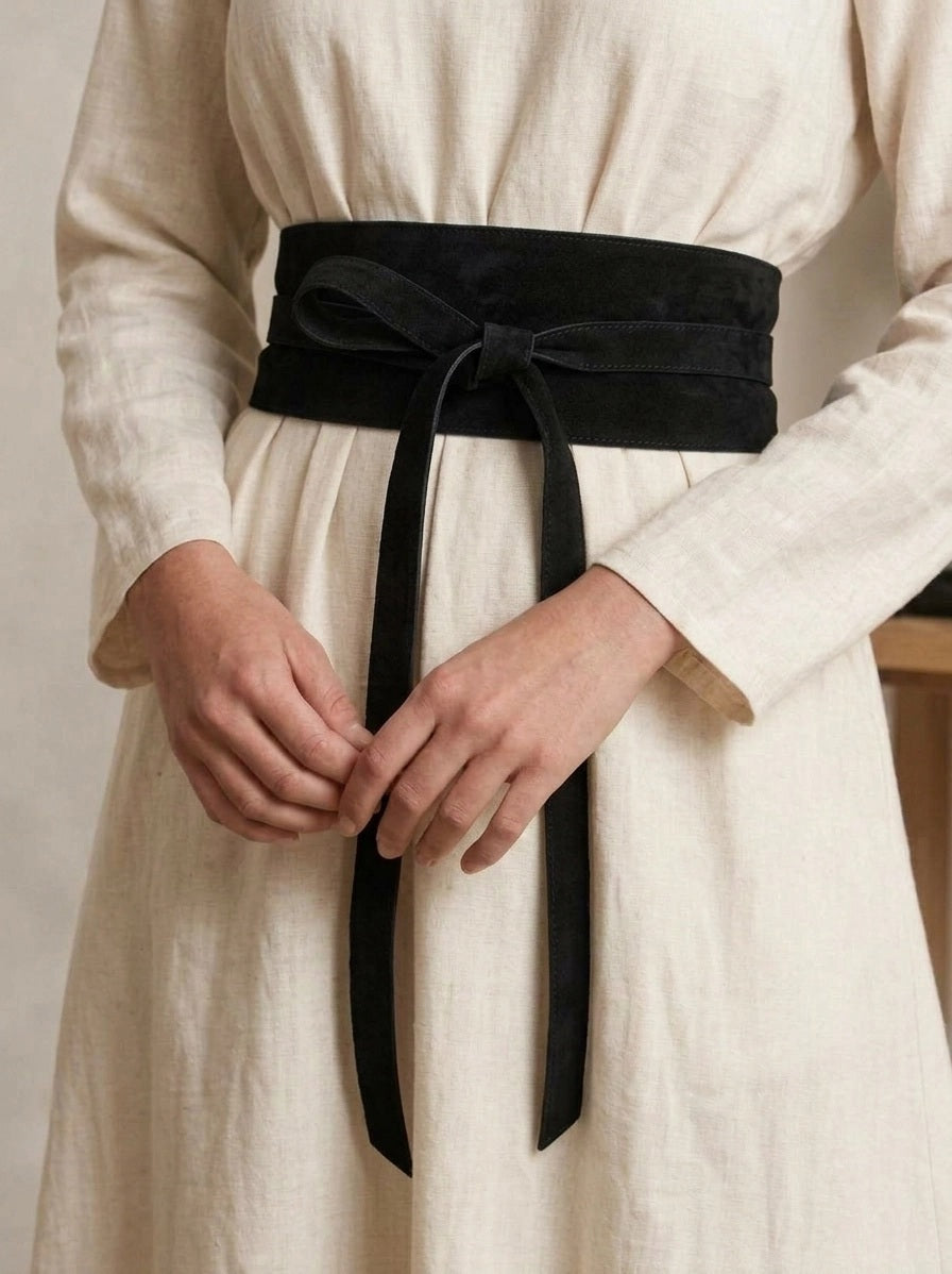 ADA - SUEDE LEATHER WRAP BELT IN BLACK featuring a black suede design with a front knot, crafted as a versatile one-size belt.