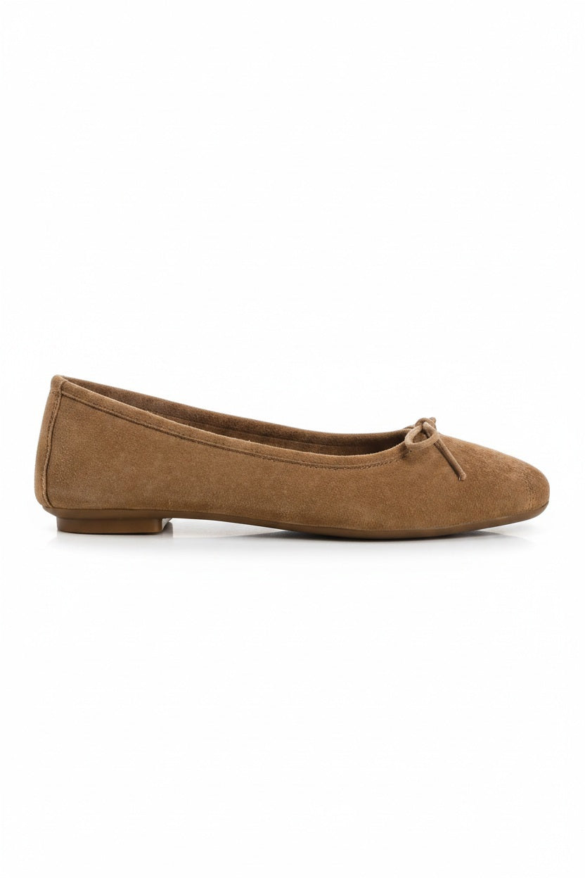 Top view of the REQINS - HARMONY SUEDE BALLERINA FLAT IN NATURAL, featuring a square toe and elegant bow detail—classic women's footwear by REQINS on a simple light background.