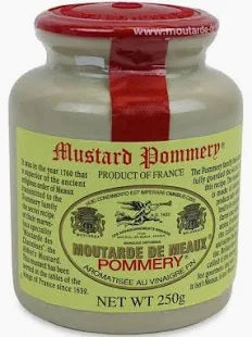 A stone jar of THE FRENCH FARM POMMERY MEAUX MUSTARD (3.5oz) features a red wax-sealed lid and a yellow label highlighting its French heritage. Labeled “Moutarde de Meaux, Net Wt 3.5oz,” this celebrated grainy mustard is cherished by chefs for its robust, nutty flavor and genuine taste.