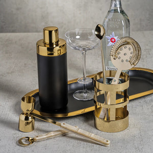 The ZODAX MONTE ORO Mixologist Cocktail Shaker in Black and Gold stands upright on a white background—a striking bar accessory for any modern home.