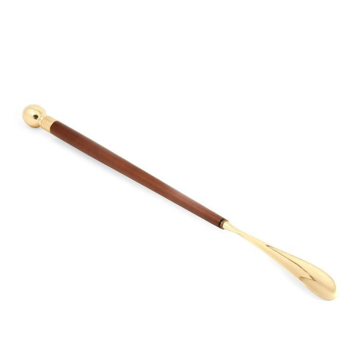 The BEYBERK INTERNATIONAL SHOE HORN AND POLISHING SPONGE features a teak wood handle with brass accents, a gold-colored scoop end, and a round gold knob, all displayed on a white background.