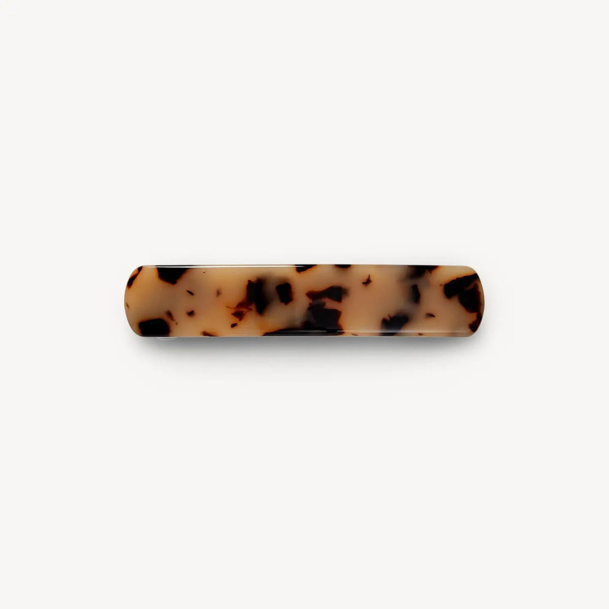 The MACHETE - NO. 3 HEIRLOOM BARRETTE by MACHETE is a rectangular barrette with rounded edges, made from cellulose acetate in a brown and black tortoiseshell pattern, shown on a plain white background.