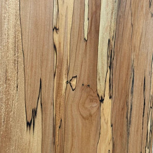 Handcrafted by PETERMANS BOARDS & BOWLS INC, the SPENCER PETERMAN - NATURAL EDGE SPALTED MAPLE RECTANGULAR BOARD 15" features a beautiful natural spalted maple grain, slightly angled sides, and a convenient small hole in the top right corner for hanging. Its dark rustic edges highlight the wood's unique character, making it an elegant choice for serving charcuterie or as a decorative cutting board.