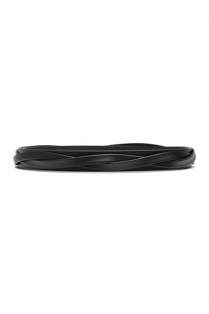 The ADA - SKINNY WRAP BELT by ADA, made from genuine Argentinian leather with a simple twisted design, is coiled into a circle on a plain white background.