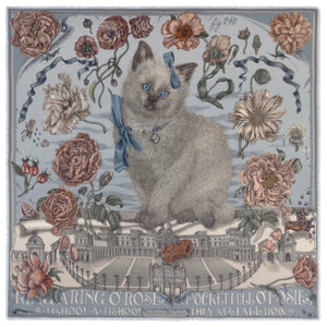 A person wearing a light-colored dress drapes the SABINA SAVAGE - RING A RING O' ROSES cashmere scarf in Glacier/Ballet over their shoulders, featuring intricate floral designs reminiscent of English garden flowers. The muted hues contrast beautifully against its soft blue-gray background.