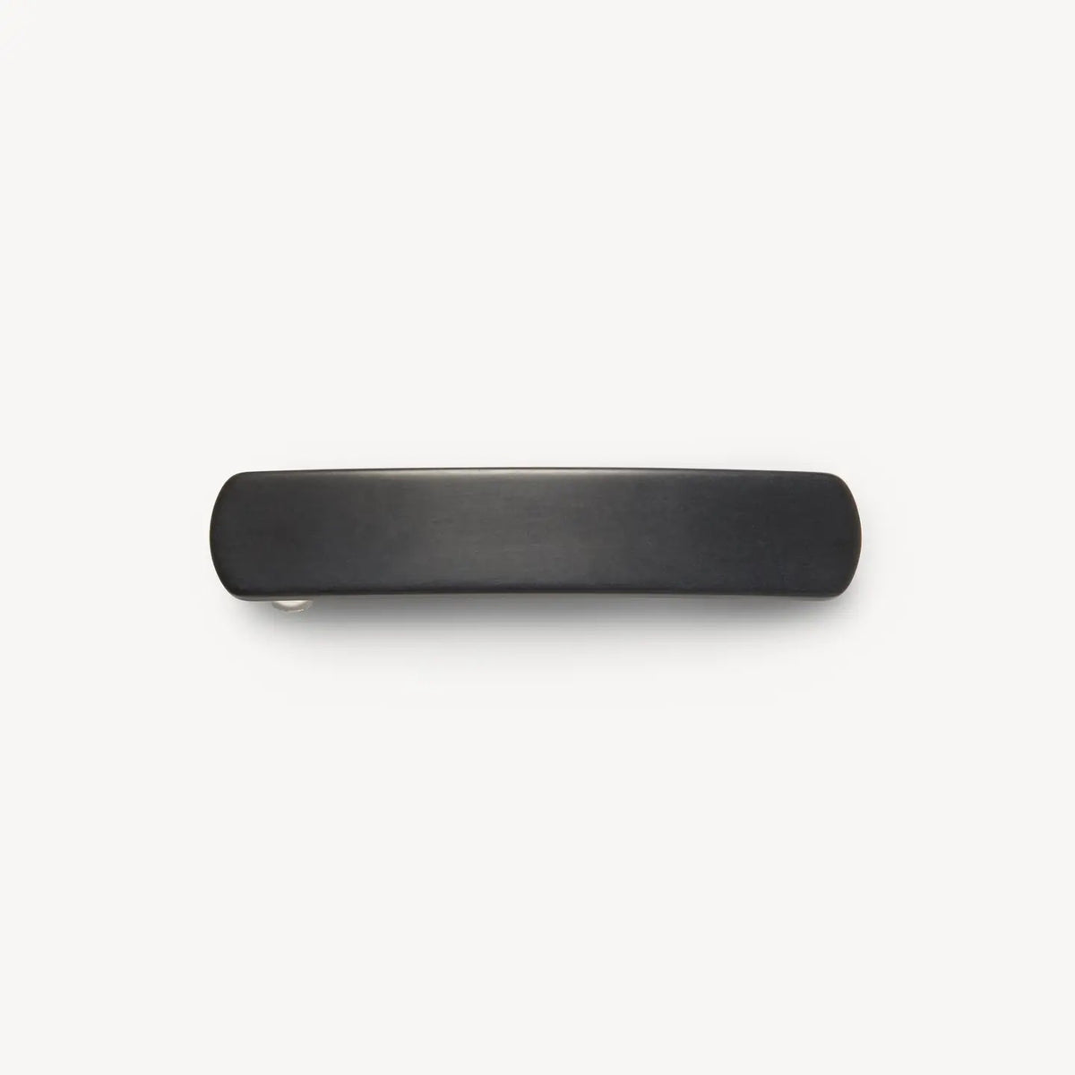 The MACHETE No. 3 Heirloom Barrette in Black Matte is a simple, handmade rectangular hair accessory with rounded edges, crafted from cellulose acetate and displayed against a plain white background.