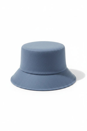 WYETH's TENLEY BUCKET HAT, a blue bucket hat made from fuzzy mohair wool and featuring a wide brim, is presented against a simple white background.