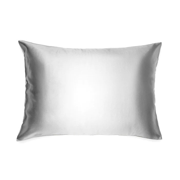 The BRANCHE - CHARMEUSE PILLOW CASE SILK comes boxed with a gray label and pink ribbon, stating “BRANCHE Sleep Luxury. Wake Up Beautiful.” Designed to reduce hair frizz and prevent wrinkles.