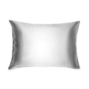 The BRANCHE - CHARMEUSE PILLOW CASE SILK comes boxed with a gray label and pink ribbon, stating “BRANCHE Sleep Luxury. Wake Up Beautiful.” Designed to reduce hair frizz and prevent wrinkles.