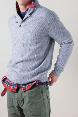 The RELWEN Ridge Twist Shawl Sweater in Pale Grey Heather is a vintage-style piece with ribbed cuffs and hem, a hood, and a small tag near the neckline, shown laid flat on a white background.