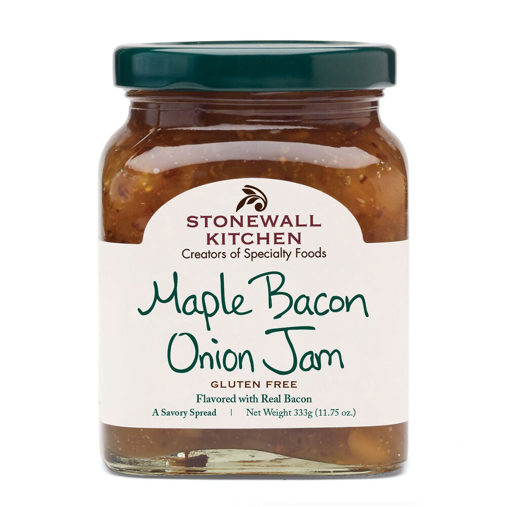 A jar of STONEWALL KITCHEN - MAPLE BACON ONION JAM combines savory bacon with authentic flavor. The label highlights its gluten-free ingredients and a weight of 333g (11.75 oz). With a green lid, it proudly states, "Creators of Specialty Foods.