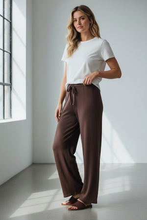Fearrington Village Frank and Eileen Catherine long wide-leg sweatpants in coco brown cotton with a drawstring waist.