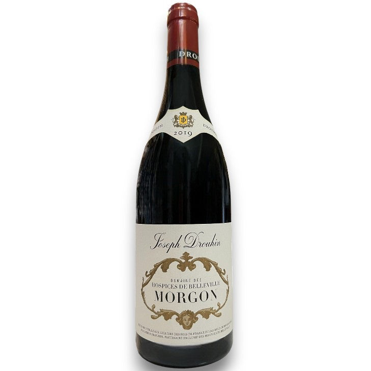 A 2019 bottle of DROUHIN HOSPICE DE BELLEVILLE MORGON BEAUJOLAIS from WINE: GRAPEVINE, made with Gamay grapes. The cream label with gold accents reads "Hospices de Belleville Morgon." Ideal for Burgundy wine lovers.