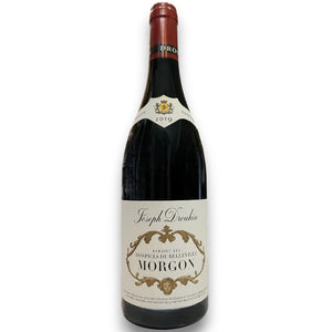 A 2019 bottle of DROUHIN HOSPICE DE BELLEVILLE MORGON BEAUJOLAIS from WINE: GRAPEVINE, made with Gamay grapes. The cream label with gold accents reads "Hospices de Belleville Morgon." Ideal for Burgundy wine lovers.