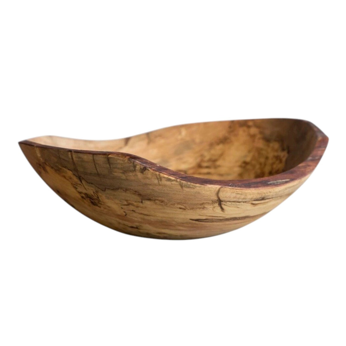 The SPENCER PETERMAN - SPALTED OVAL LIVE EDGE BOWL 15" by PETERMANS BOARDS & BOWLS INC, crafted from upcycled spalted maple wood and featuring a natural uneven rim, rests on a light gray marble surface against a plain white background.