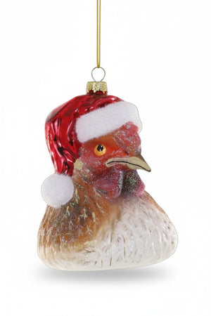 The CODY FOSTER CHICKEN CLAUS ORNAMENT is a 4-inch Christmas tree decoration shaped like a chicken's head, featuring a red and white Santa hat and a gold hanging loop at the top.